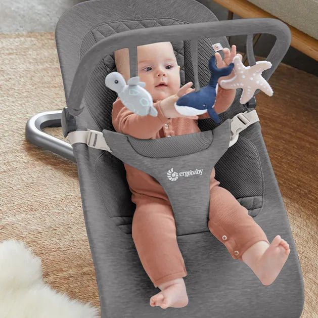 Evolve 3-in-1 Bouncer Toy Bar | Ergobaby United States