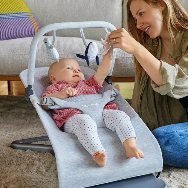 Evolve 3-in-1 Bouncer Toy Bar | Ergobaby United States