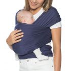 Mom wearing baby inward facing in Aura Wrap Indigo Carrier