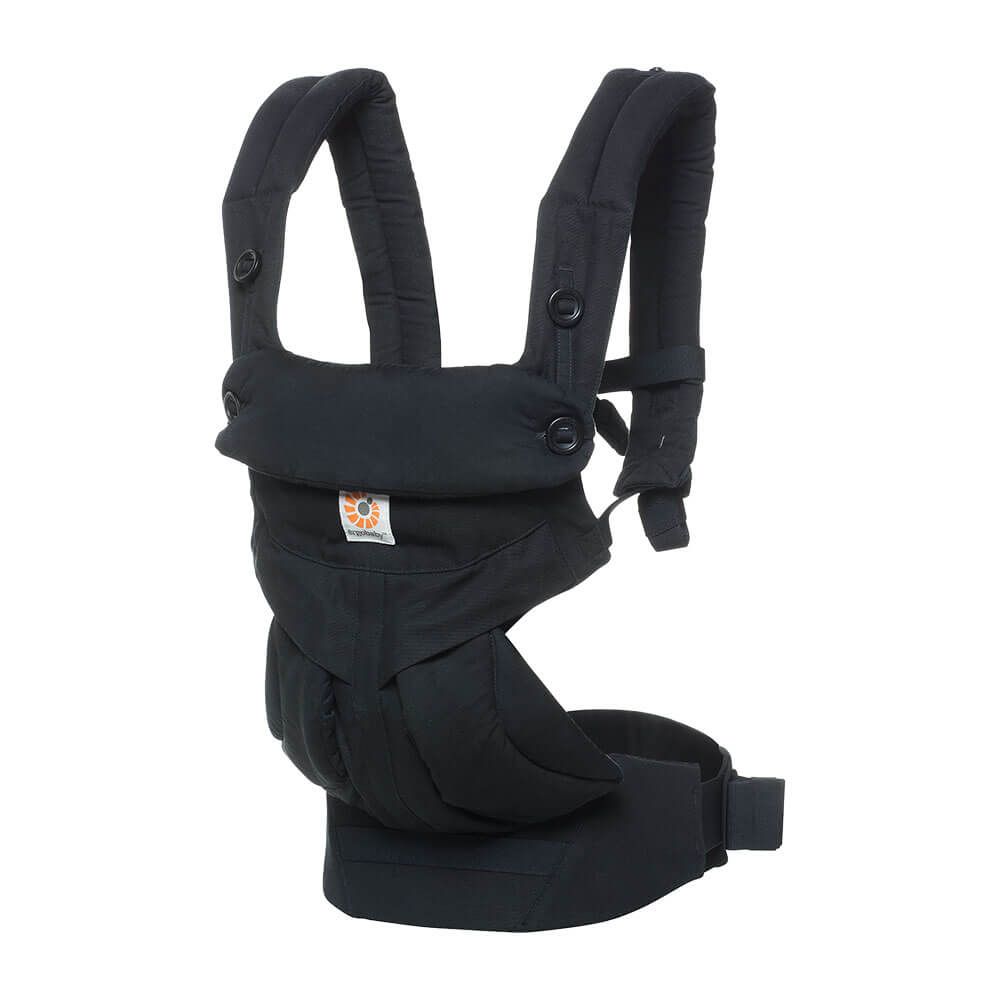 The Ergobaby Carrier, a cotton, breathable baby carrier with adjustable straps.