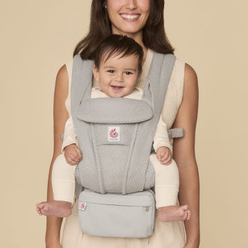 Velcro attaches to front, side, or back of Ergobaby Carriers