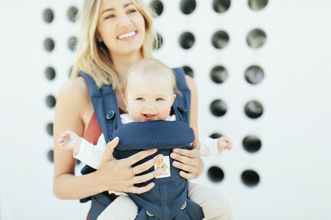 What is an ergonomic baby carrier and how does it help you and baby