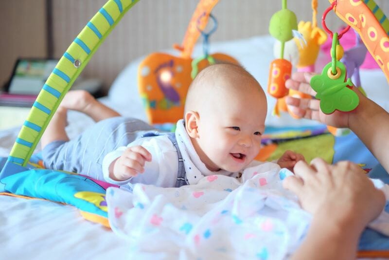 baby playing on floor